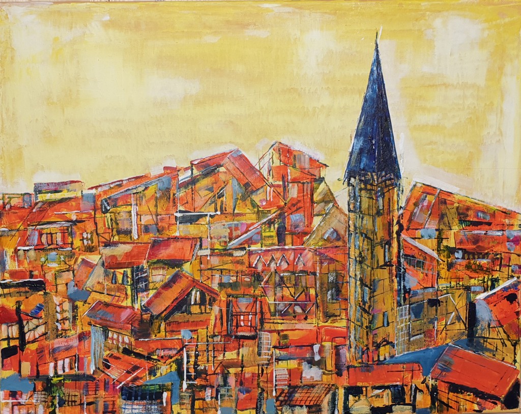 Stadt mit blauem Turm am Morgen